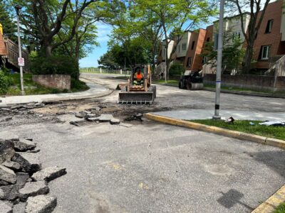 bobcat removing old asphalt