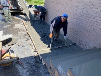 concrete walkway installation in progress