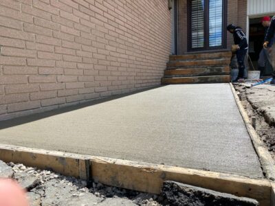 fresh concrete installation for walkway