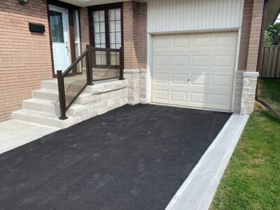 new concrete front porch and driveway completed